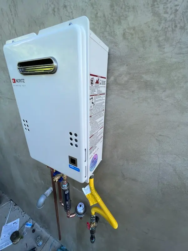 Tankless water heater installation for Wolfs Store homes